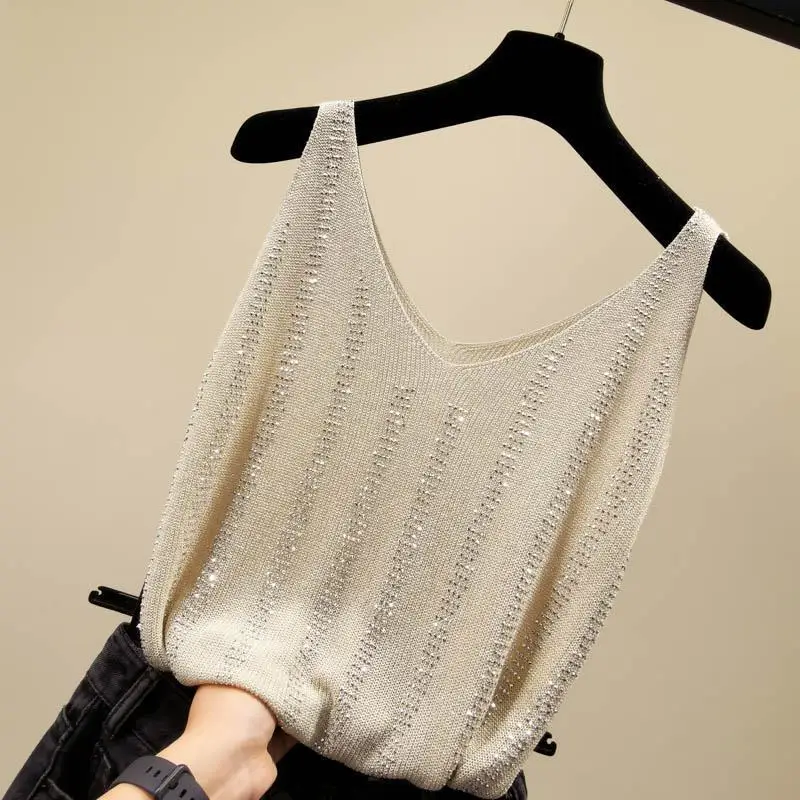 Sexy loose v-neck camisole heavy drilling sleeveless ice silk knitted sparkling silk top for women
Sexy loose v-neck camisole heavy drilling sleeveless ice silk knitted sparkling silk top for women