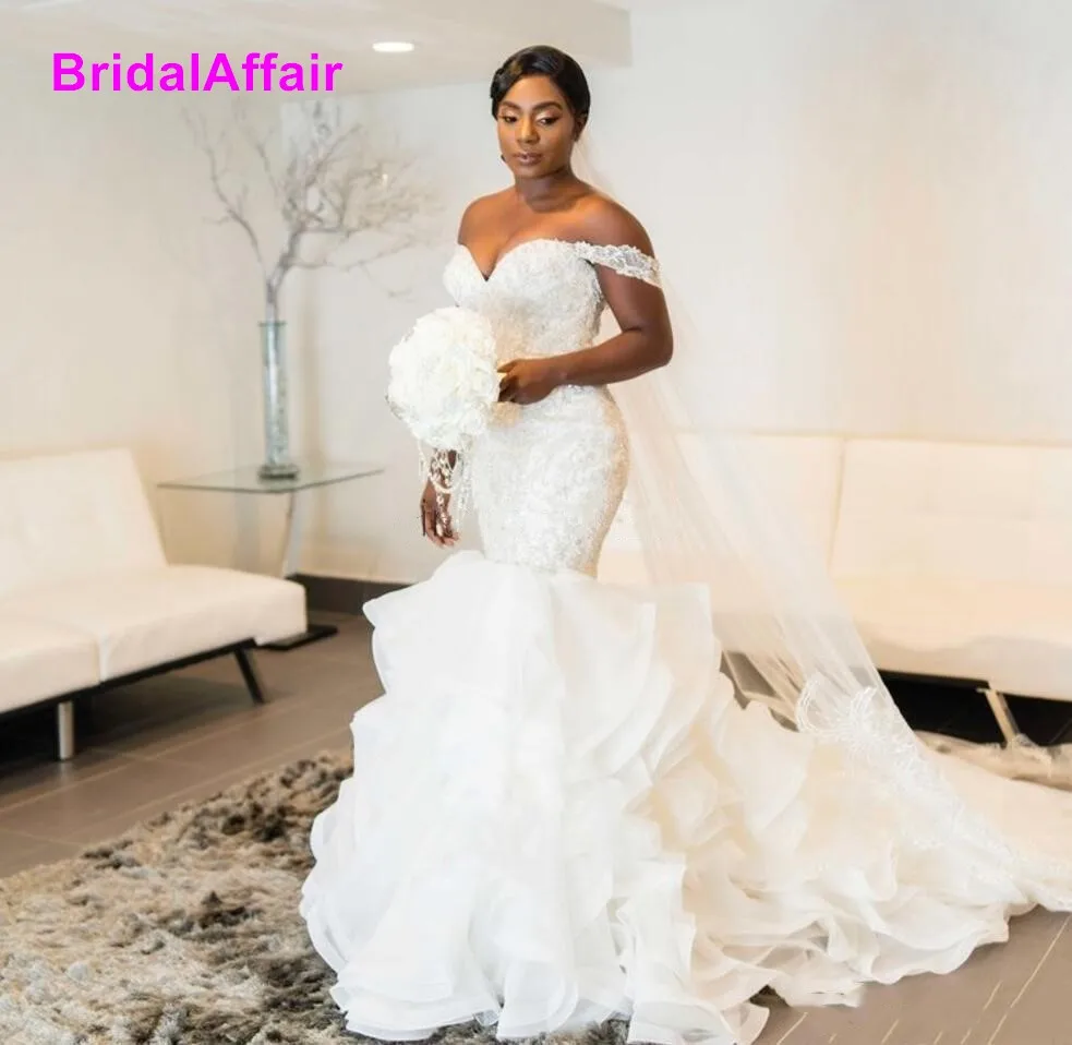 Crystal Mermaid Wedding Dresses Off Shoulder Sweep Train Cascading Ruffles Appliques Chapel Garden Bridal Gowns
Crystal Mermaid Wedding Dresses Off Shoulder Sweep Train Cascading Ruffles Appliques Chapel Garden Bridal Gowns