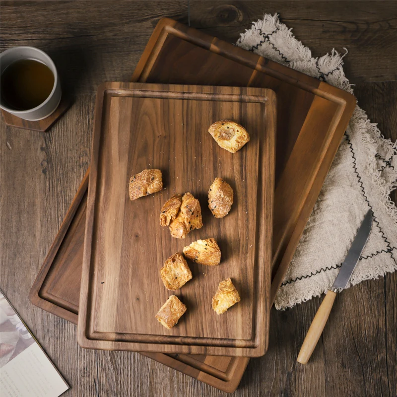 Musowood Black Walnut Wood Cutting Board Solid Wooden Chopping Board for Bread Trays with Juice Grooves & Carrying
Musowood Black Walnut Wood Cutting Board Solid Wooden Chopping Board for Bread Trays with Juice Grooves & Carrying