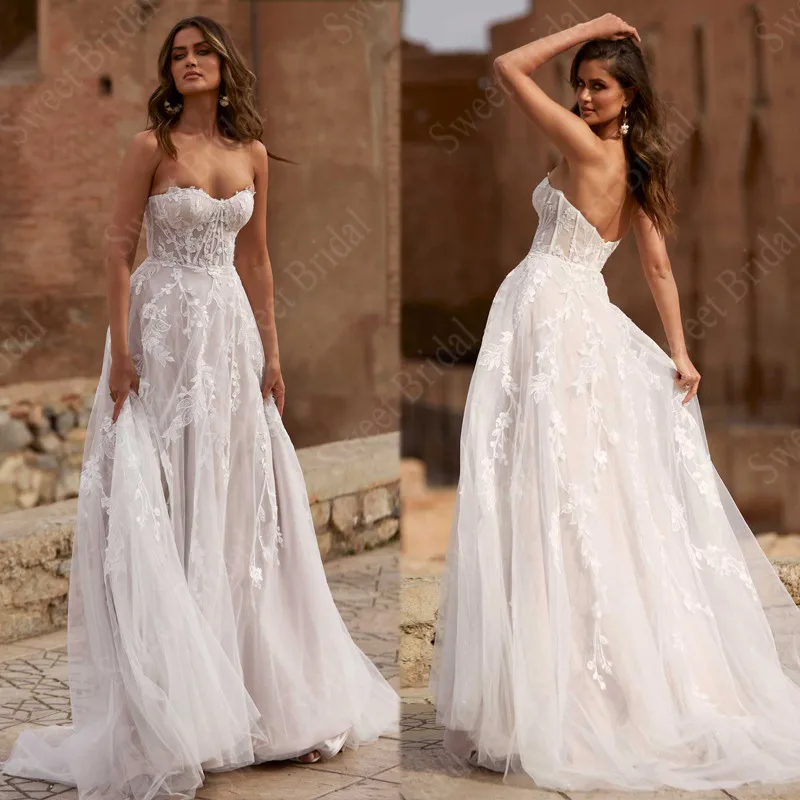 Strapless Lace Beach Wedding Dresses 2021 Lace Appliques Sleeveless Zipper Back Boho Bridal Gowns Vestido De Noiva Custom Made
Strapless Lace Beach Wedding Dresses 2021 Lace Appliques Sleeveless Zipper Back Boho Bridal Gowns Vestido De Noiva Custom Made