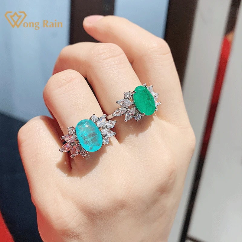 Wong Rain 100% 925 Sterling Silver Oval Paraiba Tourmaline Emerald Gemstone Wedding Engagement Ring Fine Jewelry Wholesale
Wong Rain 100% 925 Sterling Silver Oval Paraiba Tourmaline Emerald Gemstone Wedding Engagement Ring Fine Jewelry Wholesale