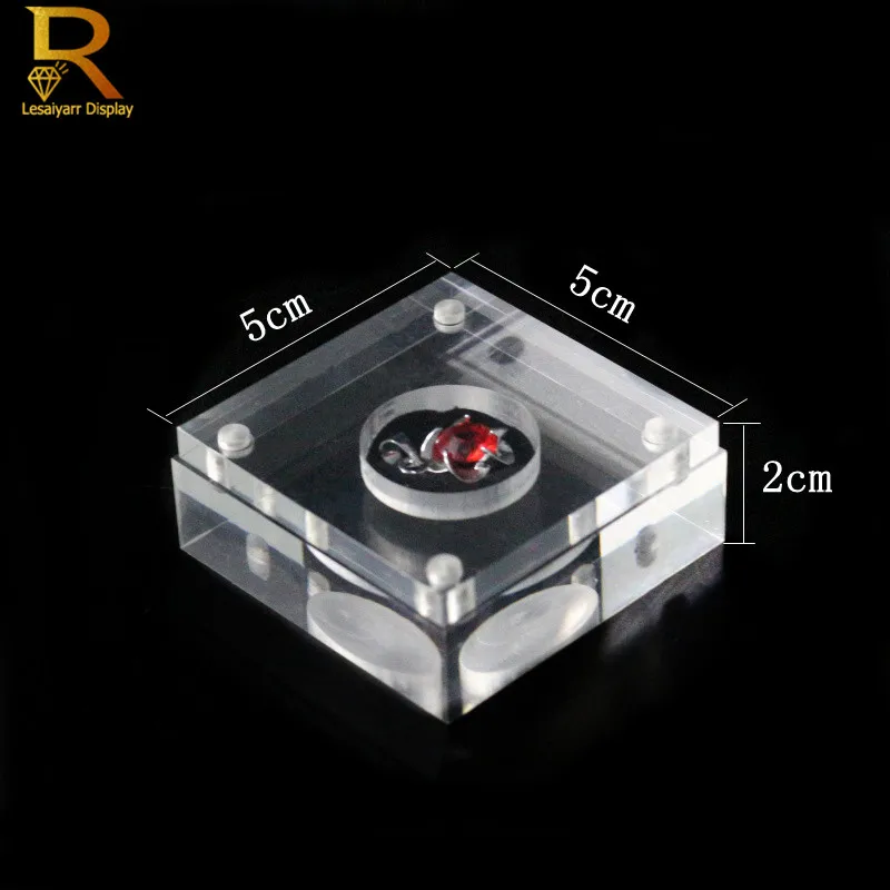 Прозрачный акриловый держатель драгоценных камней для свадебных ювелирных изделий, поднос для демонстрации драгоценных камней, квадратная коробка 5*5*2 см
Прозрачный акриловый держатель драгоценных камней для свадебных ювелирных изделий, поднос для демонстрации драгоценных камней, квадратная коробка 5*5*2 см