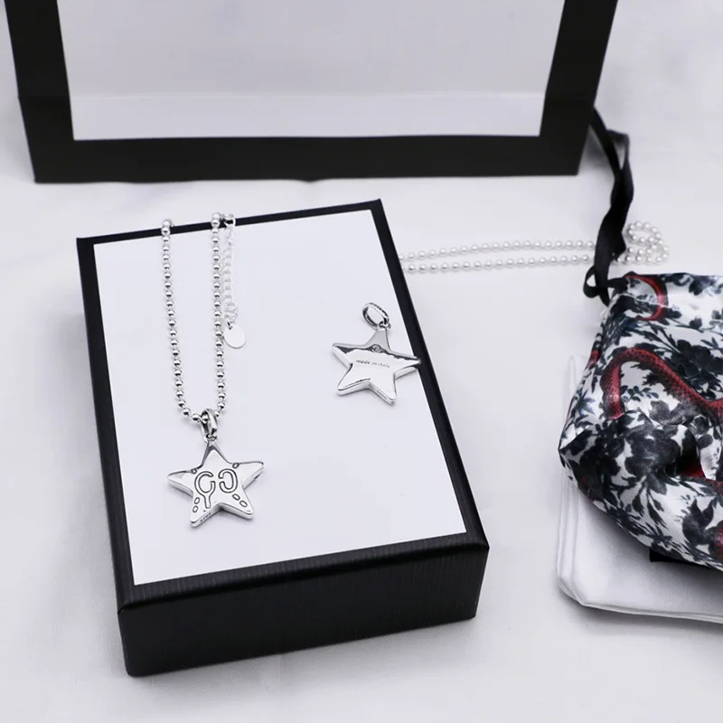 Double G enamel 925 sterling silver star pendant fashion simple men and women necklace wild couple necklace holiday gift
Double G enamel 925 sterling silver star pendant fashion simple men and women necklace wild couple necklace holiday gift