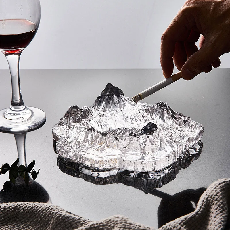 Northern Europe simple modern creative glass snow mountain ashtray personalized family living room coffee table trend cigarette
Northern Europe simple modern creative glass snow mountain ashtray personalized family living room coffee table trend cigarette