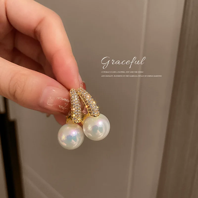 European And American Fashion Network Red Trend Super Flash Large Pearl Zircon Temperament Earrings Women
European And American Fashion Network Red Trend Super Flash Large Pearl Zircon Temperament Earrings Women