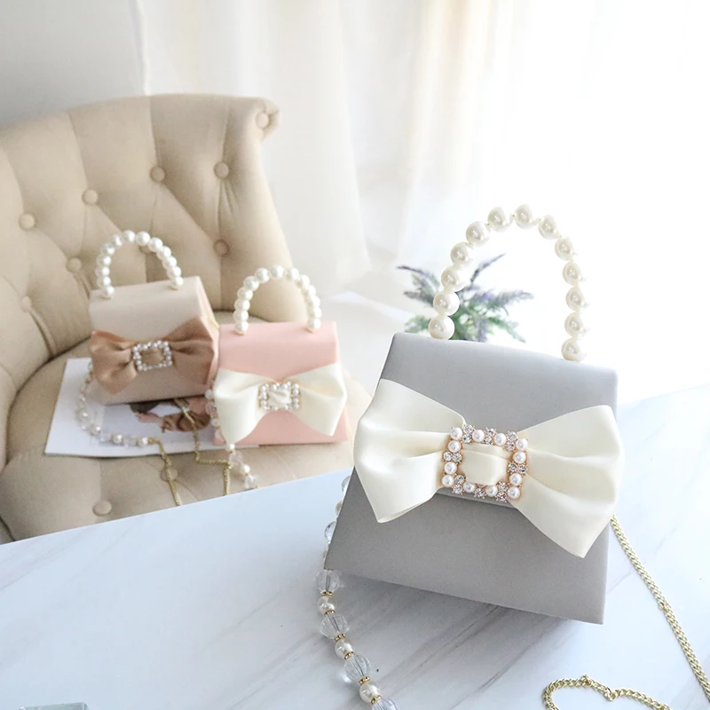 2022 Elegant Banquet Pearl Tote bag Fashion New High Quality Leather Women's Designer Handbag Lock Chain Shoulder Messenger Bag
2022 Elegant Banquet Pearl Tote bag Fashion New High Quality Leather Women's Designer Handbag Lock Chain Shoulder Messenger Bag