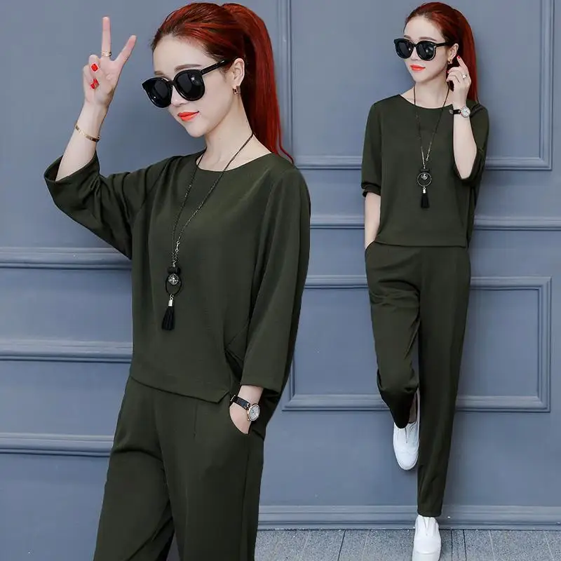 2021 Summer Women Fashion Loose Solid Sports Suits O-neck Half-sleeve Tops + High Waist Harlan Pants Two-piece Set M-4XL Y664
2021 Summer Women Fashion Loose Solid Sports Suits O-neck Half-sleeve Tops + High Waist Harlan Pants Two-piece Set M-4XL Y664