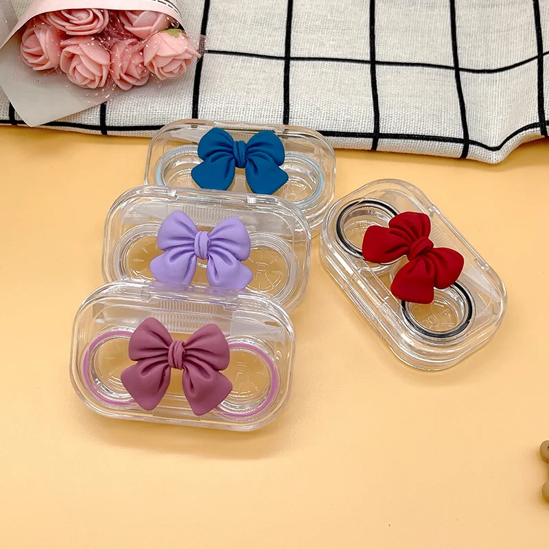 Transparent Flip Cover Contact Lens Box with Bow Tie Women Girl Contact Lense Case with Stable Supply Cute Contact Lens Cases
Transparent Flip Cover Contact Lens Box with Bow Tie Women Girl Contact Lense Case with Stable Supply Cute Contact Lens Cases