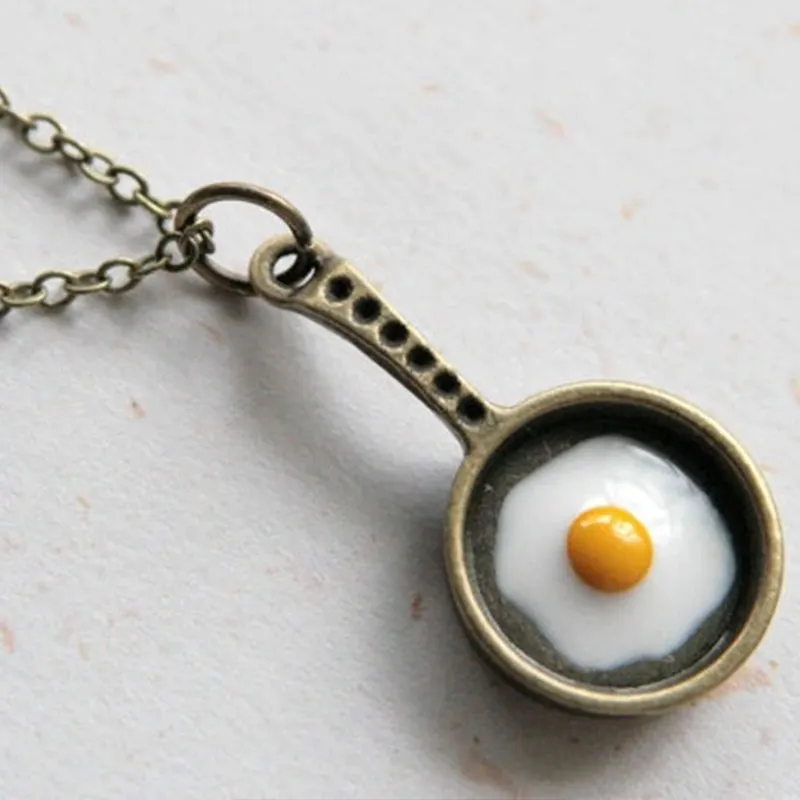 Michaela Female Creative Fashion Jewelry Lovers Boudoir Honey Lovely Frying Pan Fried Egg Earth Cool Debutante Hip-Hop Necklace.
Michaela Female Creative Fashion Jewelry Lovers Boudoir Honey Lovely Frying Pan Fried Egg Earth Cool Debutante Hip-Hop Necklace.