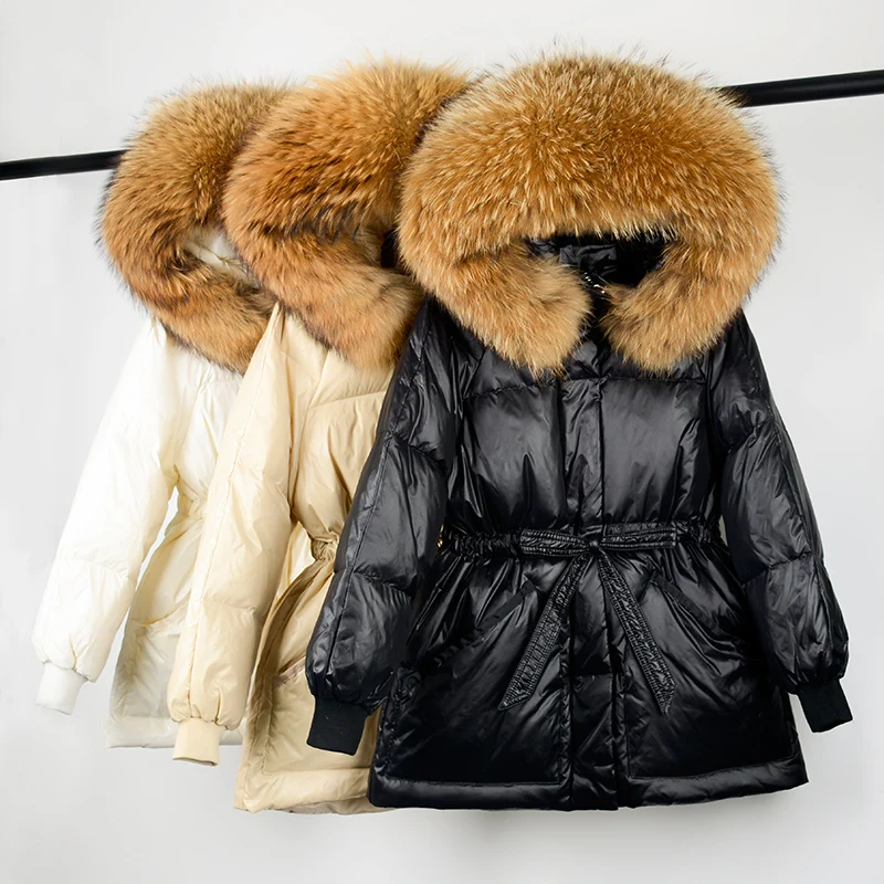 

Новинка 2021, зимняя куртка на белом утином пуху, женское огромное пуховое пальто с капюшоном из натурального меха енота, женское офисное паль...