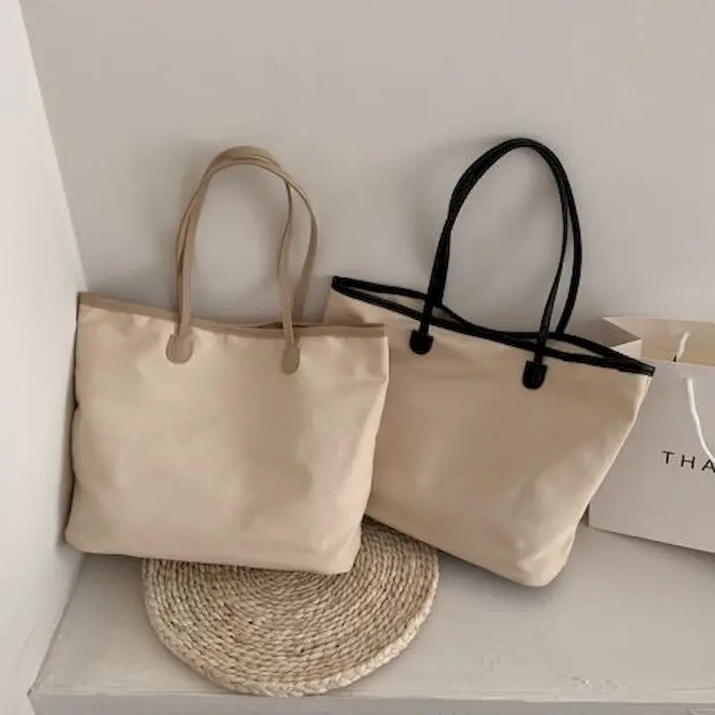 Canvas Bag Female 2021 New Korean Version of Large Capacity Canvas Bag Student Wild Simple Shoulder Bag Portable Large Bag
Canvas Bag Female 2021 New Korean Version of Large Capacity Canvas Bag Student Wild Simple Shoulder Bag Portable Large Bag
