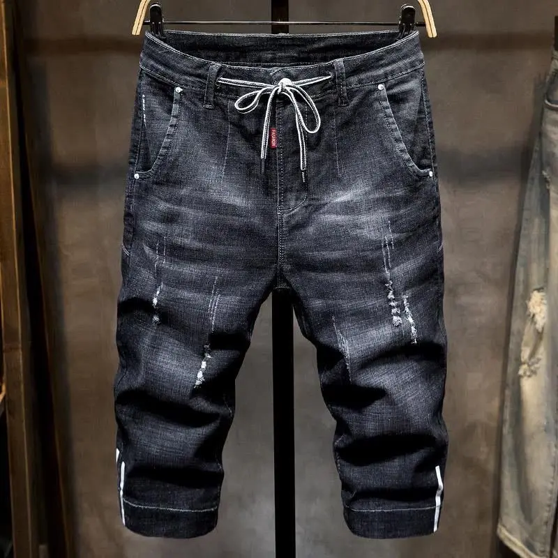 Summer thin seven-point Harlan jeans men's loose shorts Korean fashion casual 7-point tide brand tooling breeches
Summer thin seven-point Harlan jeans men's loose shorts Korean fashion casual 7-point tide brand tooling breeches