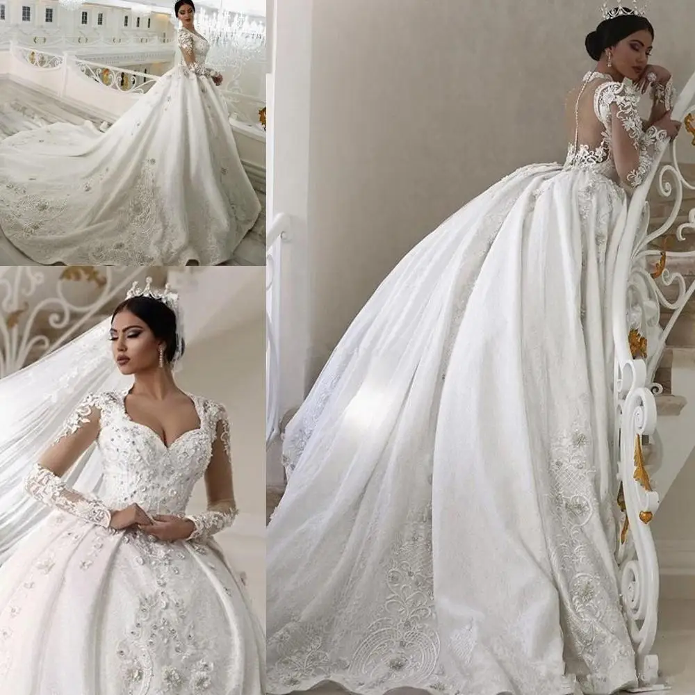 Princess Long Sleeve 2021 Ball Gown Wedding Dresses Sheer Back Sparkly Crystals Chapel Train Lace Vintage Bridal Gown for Church
Princess Long Sleeve 2021 Ball Gown Wedding Dresses Sheer Back Sparkly Crystals Chapel Train Lace Vintage Bridal Gown for Church