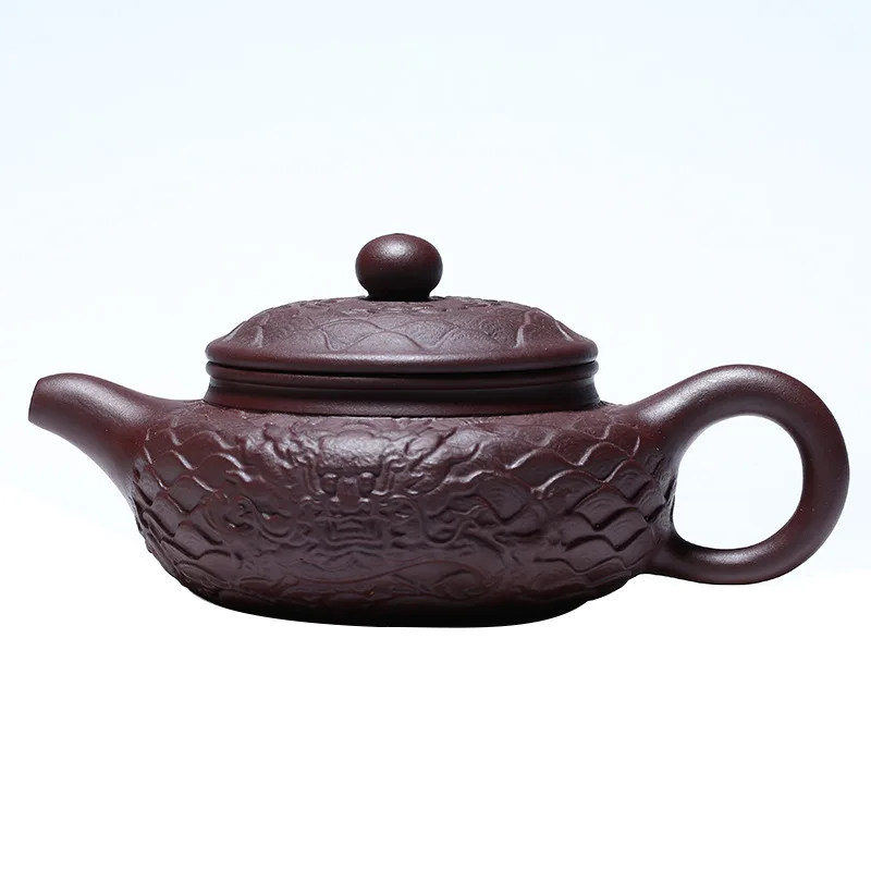 Yixing handmade teapot raw ore purple clay dragon pattern antique tea pot shop
Yixing handmade teapot raw ore purple clay dragon pattern antique tea pot shop