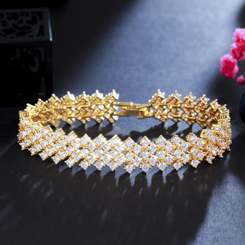 ThreeGraces великолепный фианит золотой цвет Свадебная вечеринка Теннисный браслет для женщин нигерийский костюм в дубайском стиле ювелирное и...
ThreeGraces великолепный фианит золотой цвет Свадебная вечеринка Теннисный браслет для женщин нигерийский костюм в дубайском стиле ювелирное и...