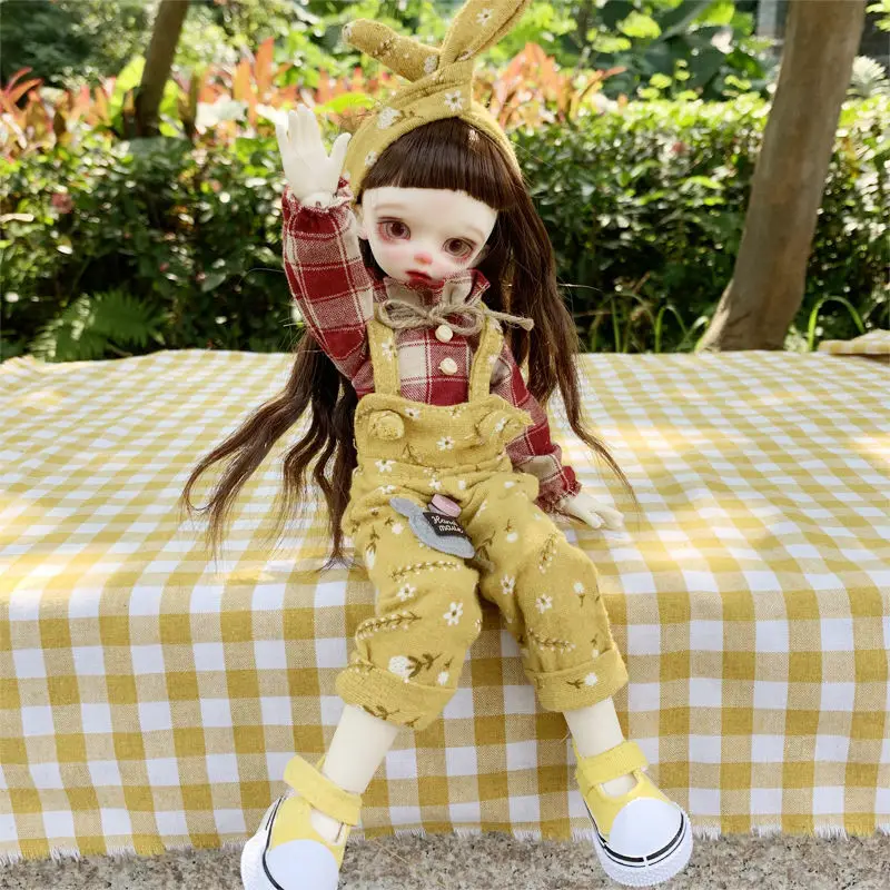 Одежда для куклы BJD подходит для 1/6 модных рубашек в клетку, цветочных подтяжек, головных уборов с бантом и обуви, новый маленький костюм
Одежда для куклы BJD подходит для 1/6 модных рубашек в клетку, цветочных подтяжек, головных уборов с бантом и обуви, новый маленький костюм