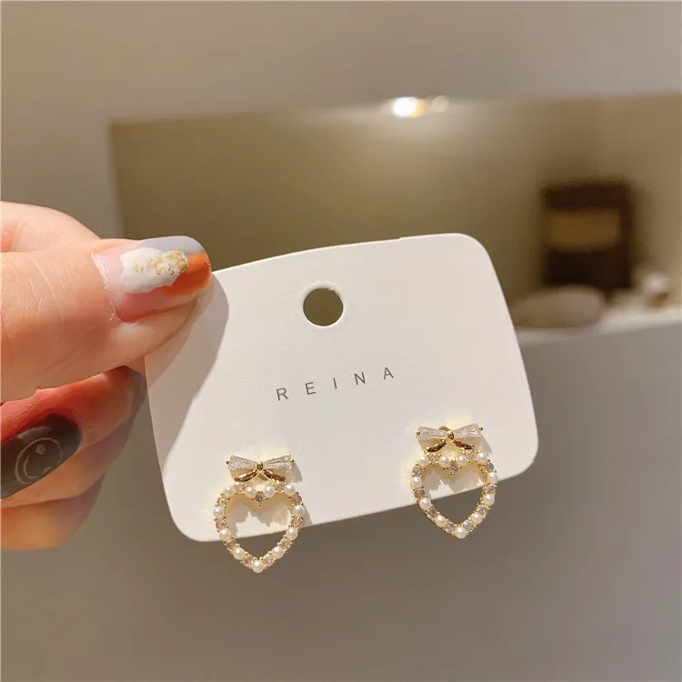 Classic Bowknot Zircon Women Stud Earrings Lovely Heart Bow Tie Pearl Ear Studs Fashion Jewelry Womens Accessories Earrings
Classic Bowknot Zircon Women Stud Earrings Lovely Heart Bow Tie Pearl Ear Studs Fashion Jewelry Womens Accessories Earrings