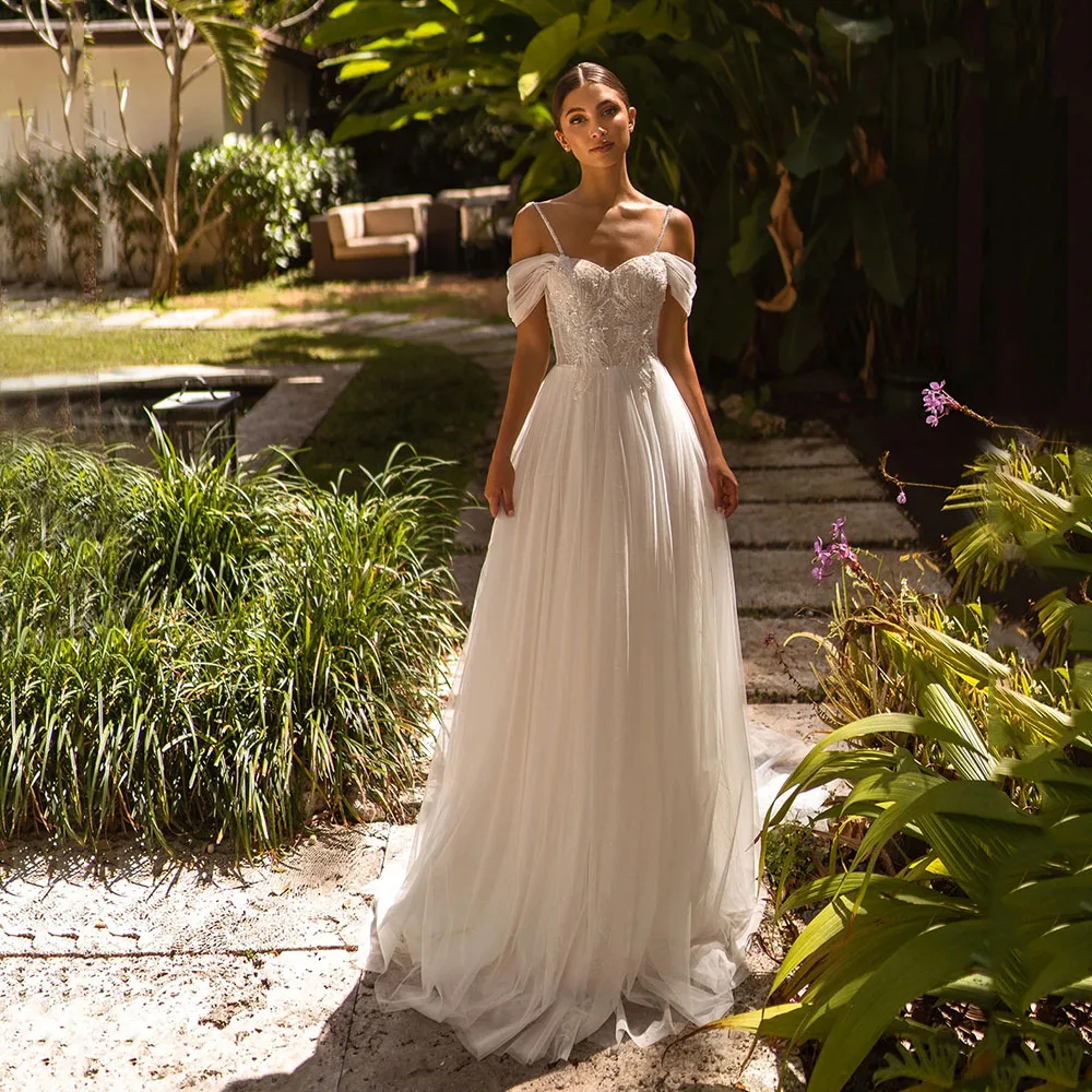 Fashion A Line Tulle Spaghetti Straps Wedding Gown Zipper Back Simple Beach Party Bridal Dresses Custom Made Floor Length
Fashion A Line Tulle Spaghetti Straps Wedding Gown Zipper Back Simple Beach Party Bridal Dresses Custom Made Floor Length