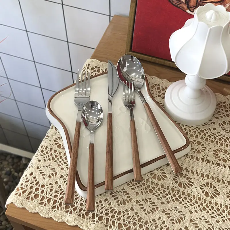Stainless Steel Spoon Fork Long Handle Household Exquisite Western Tableware Steak Knife Fork Spoon Dessert Small Spoon
Stainless Steel Spoon Fork Long Handle Household Exquisite Western Tableware Steak Knife Fork Spoon Dessert Small Spoon