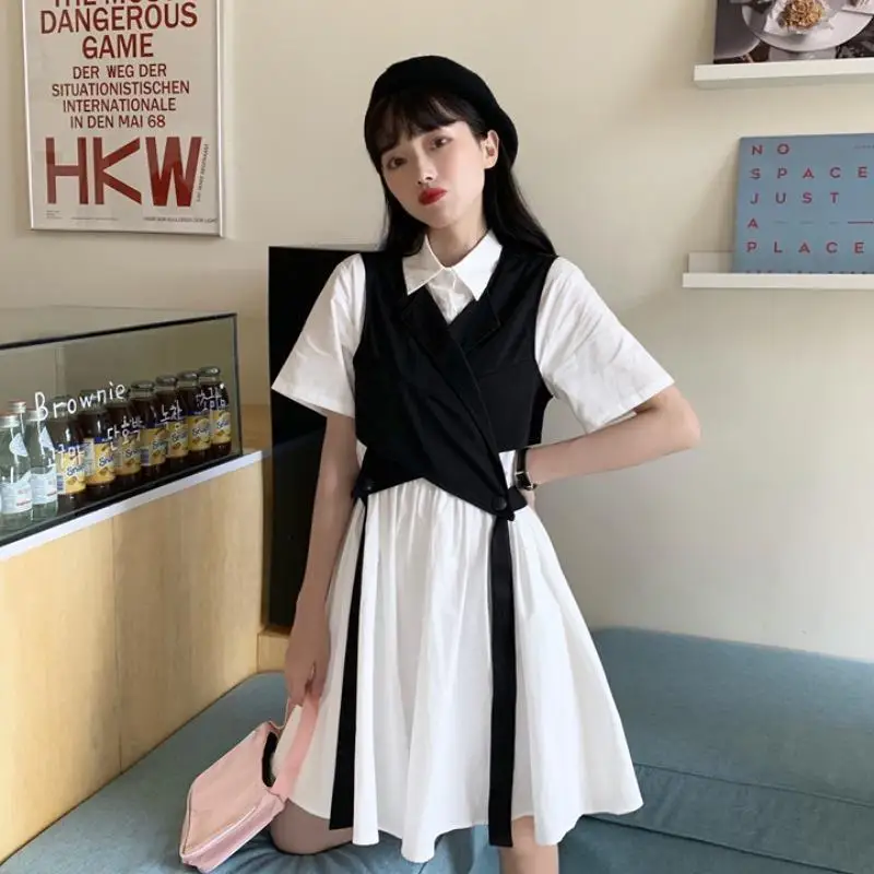 Summer new Hepburn style tooling vest white shirt dress two-piece female dress short-sleeved loose student style dress for women
Summer new Hepburn style tooling vest white shirt dress two-piece female dress short-sleeved loose student style dress for women