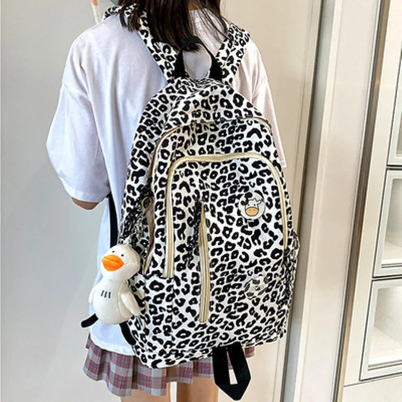 2021 Leopard and Cow Pattern Fashion Women's Backpack Nylon Waterproof Schoolbag For Girls Large-capacity notebook Travel Bags
2021 Leopard and Cow Pattern Fashion Women's Backpack Nylon Waterproof Schoolbag For Girls Large-capacity notebook Travel Bags