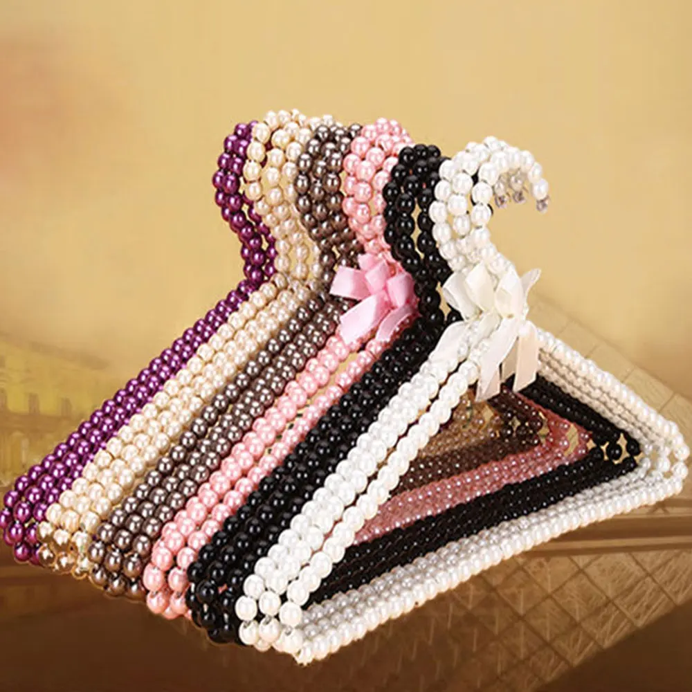 Clothes Hanger Plastic Pearl Home Closet Space Saver Clothes Dress Storage Rack Home Organization Tools Bow Hanger 1/2/5pcs
Clothes Hanger Plastic Pearl Home Closet Space Saver Clothes Dress Storage Rack Home Organization Tools Bow Hanger 1/2/5pcs
