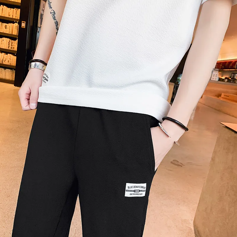 8160C Summer Men's Casual Suit Short Sleeves Tops Solid Leisure Tees With Knee Length Black Pants Letter Print M-3XL 3 Colors
8160C Summer Men's Casual Suit Short Sleeves Tops Solid Leisure Tees With Knee Length Black Pants Letter Print M-3XL 3 Colors