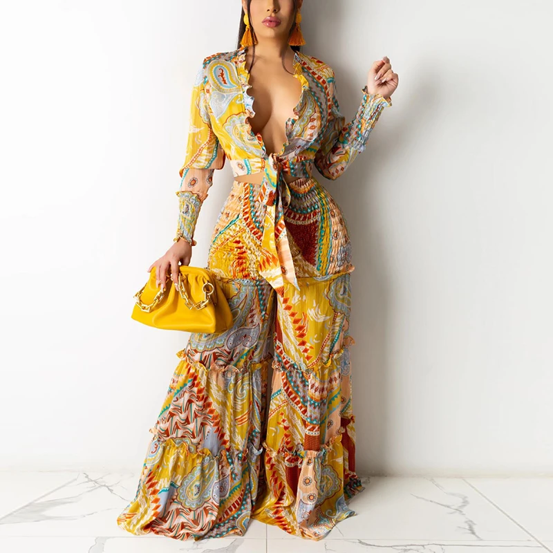 Ruffles deep V-neck Long Sleeve Tie Front Blouse & Wide Leg Loose Pants printing Two Piece Set
Ruffles deep V-neck Long Sleeve Tie Front Blouse & Wide Leg Loose Pants printing Two Piece Set