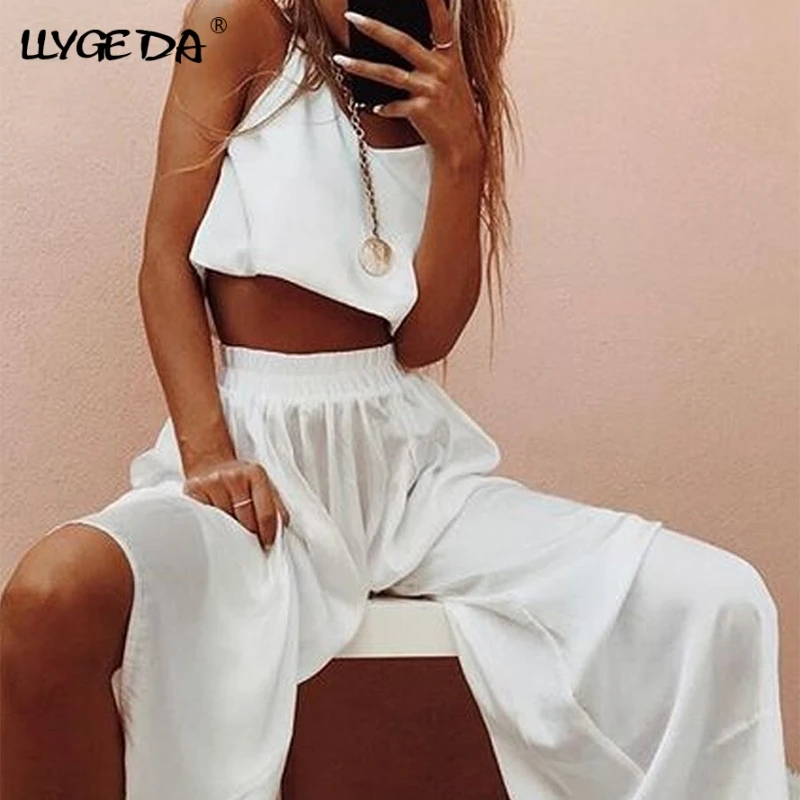 Женский однотонный Костюм-двойка, базовый Повседневный кроп-топ на бретелях, брюки с широкими штанинами, спортивный костюм для женщин, модн... 
Женский однотонный Костюм-двойка, базовый Повседневный кроп-топ на бретелях, брюки с широкими штанинами, спортивный костюм для женщин, модн...