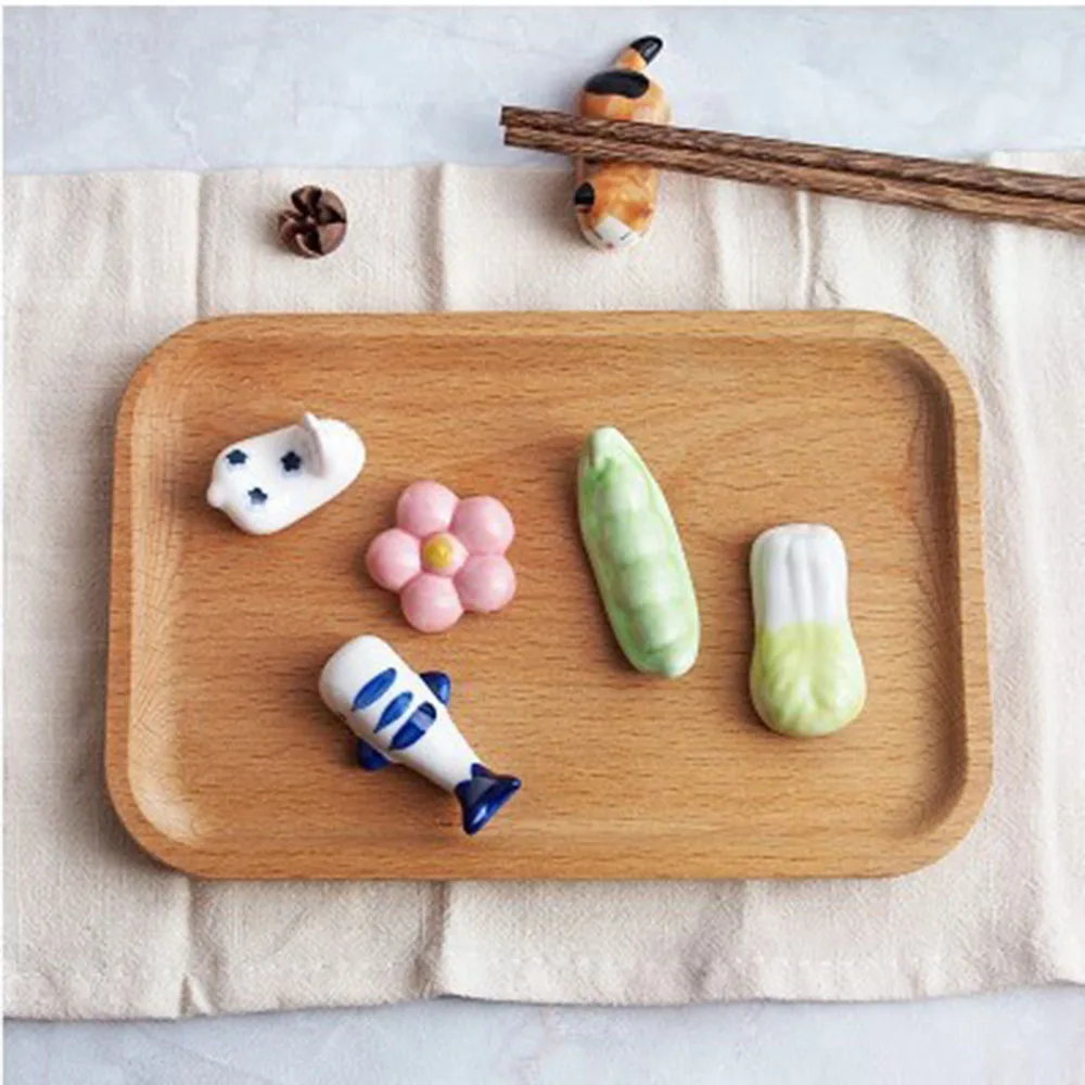 New Japanese Style Ceramic Chopsticks Holder Stand Animal Vegetables Fuit Design Chopstick Rack Pillow Rest Kitchen Tableware
New Japanese Style Ceramic Chopsticks Holder Stand Animal Vegetables Fuit Design Chopstick Rack Pillow Rest Kitchen Tableware