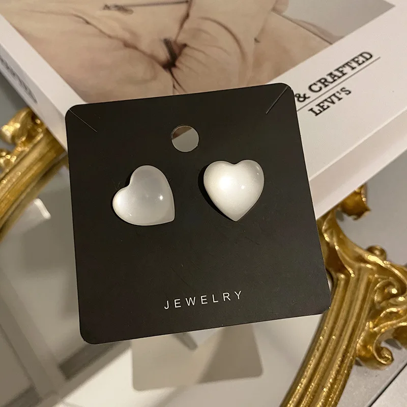 S925 Silver Needle French Earrings Fairy High-level Cat Eye White Moonlight Love Earrings Girl Peach Heart Earrings Temperament
S925 Silver Needle French Earrings Fairy High-level Cat Eye White Moonlight Love Earrings Girl Peach Heart Earrings Temperament