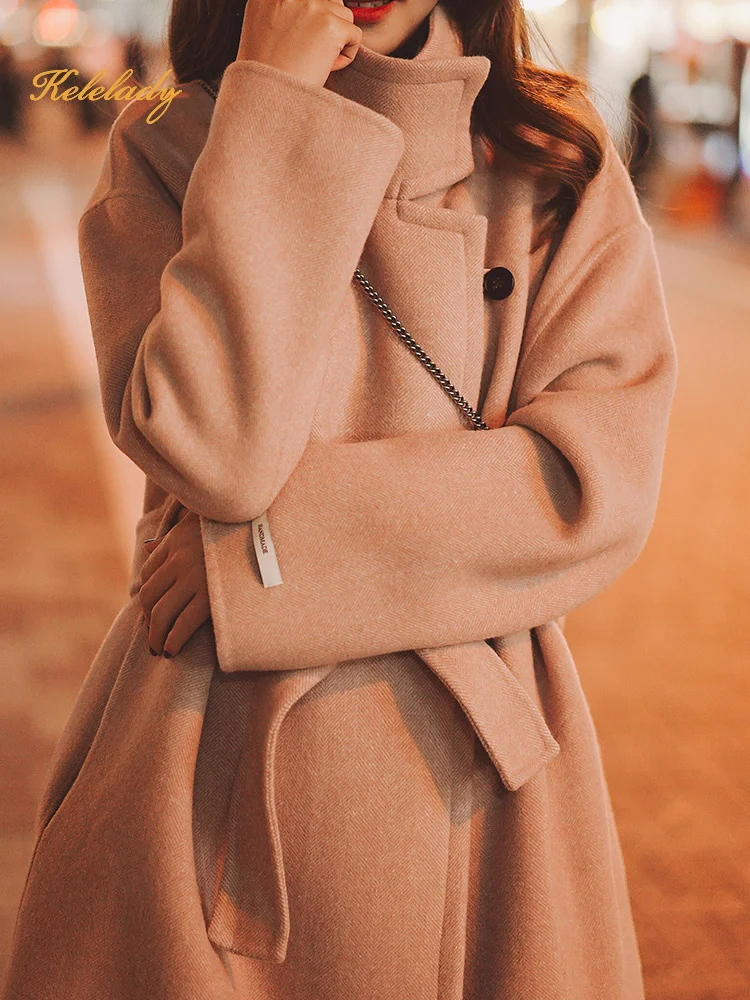 Herringbone wool double-sided tweed cashmere free coat women's middle and long winter 2019 new lace up thickened tweed coat
Herringbone wool double-sided tweed cashmere free coat women's middle and long winter 2019 new lace up thickened tweed coat