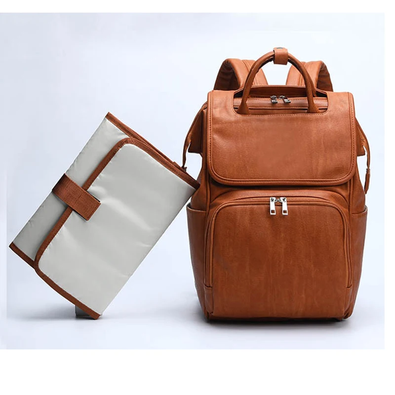 Waterproof PU Leather Baby Diaper Bag Backpack Fashion Quality Multifunction Maternity Bag With Changing Pad And Stroller Straps
Waterproof PU Leather Baby Diaper Bag Backpack Fashion Quality Multifunction Maternity Bag With Changing Pad And Stroller Straps