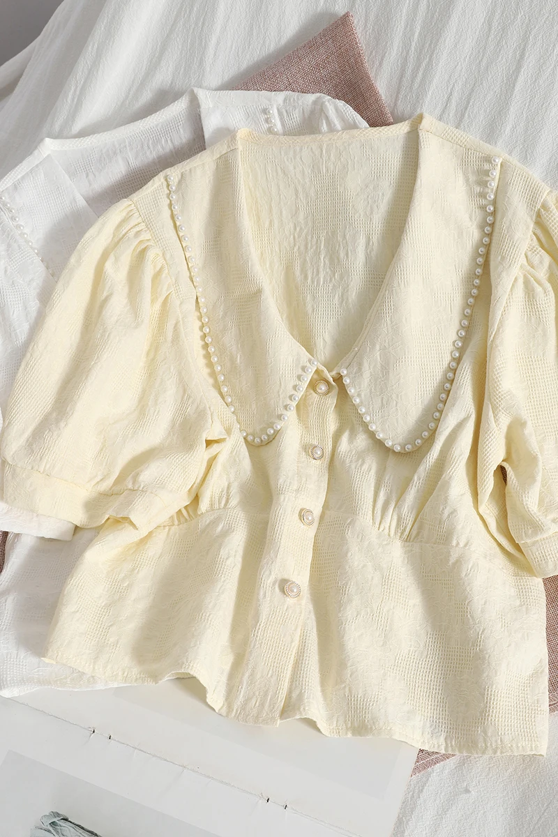 VANOVICH Beaded Lapel Temperament Women Shirt 2021 Summer New Fashion Puff Sleeve Korean Style Single Breasted Women Clothing
VANOVICH Beaded Lapel Temperament Women Shirt 2021 Summer New Fashion Puff Sleeve Korean Style Single Breasted Women Clothing