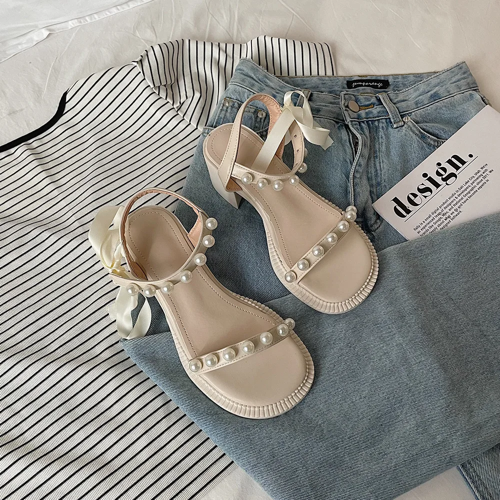 Sandals Women's Shoes Summer 2021 New Mid-heel Temperament Thick-heeled Summer Pearl Ribbon Word Roman Shoes Ladies
Sandals Women's Shoes Summer 2021 New Mid-heel Temperament Thick-heeled Summer Pearl Ribbon Word Roman Shoes Ladies