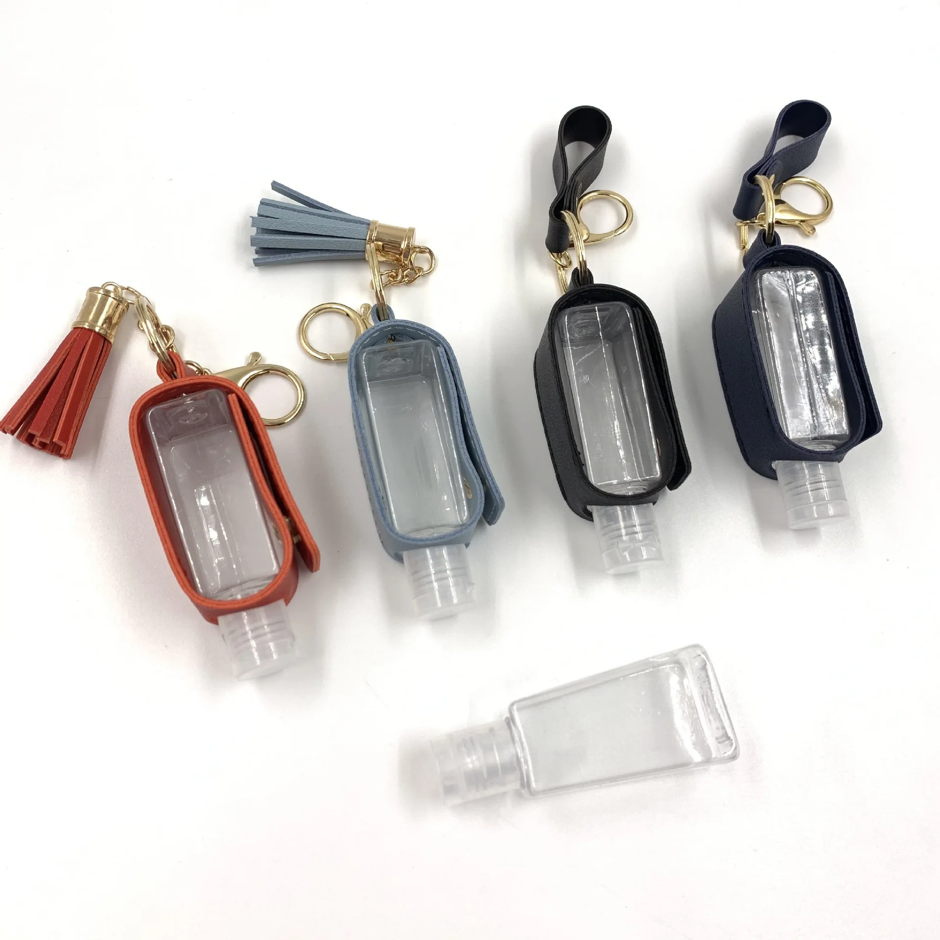 Leather hand sanitizer key chain tassel hand sanitizer empty bottle with Key Chain leather case pendant accessories Key Ring
Leather hand sanitizer key chain tassel hand sanitizer empty bottle with Key Chain leather case pendant accessories Key Ring
