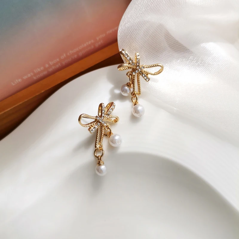 Mihan S925 needle Women Jewelry Bow Earrings Pretty Design Simulated Pearl High Quality Shiny Crystal Drop Earrings For Gifts
Mihan S925 needle Women Jewelry Bow Earrings Pretty Design Simulated Pearl High Quality Shiny Crystal Drop Earrings For Gifts