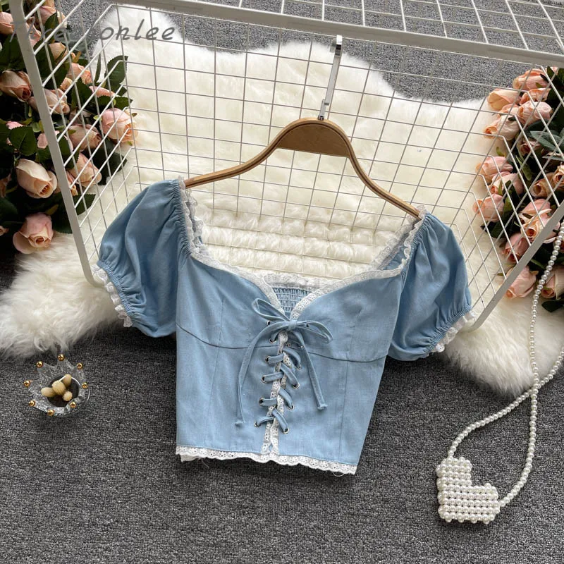 2021 Women Summer Sweet Denim Shirt Coat Lace Bandage Slim Short Paragraph Puff Sleeve Holiday Small Female Fashion Top
2021 Women Summer Sweet Denim Shirt Coat Lace Bandage Slim Short Paragraph Puff Sleeve Holiday Small Female Fashion Top