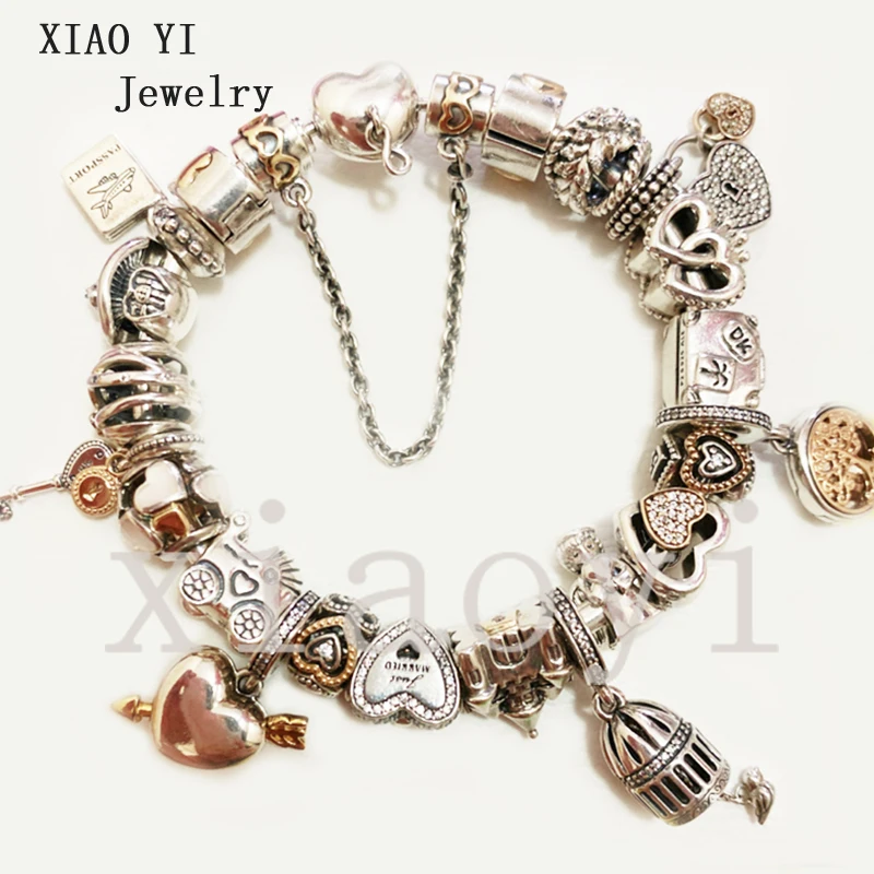 XIAOYI 2020 New 100% S925 Suitcase stroller heart arrow book Castle Tree of Life Crown key bird cage bracelet Valentine gift
XIAOYI 2020 New 100% S925 Suitcase stroller heart arrow book Castle Tree of Life Crown key bird cage bracelet Valentine gift