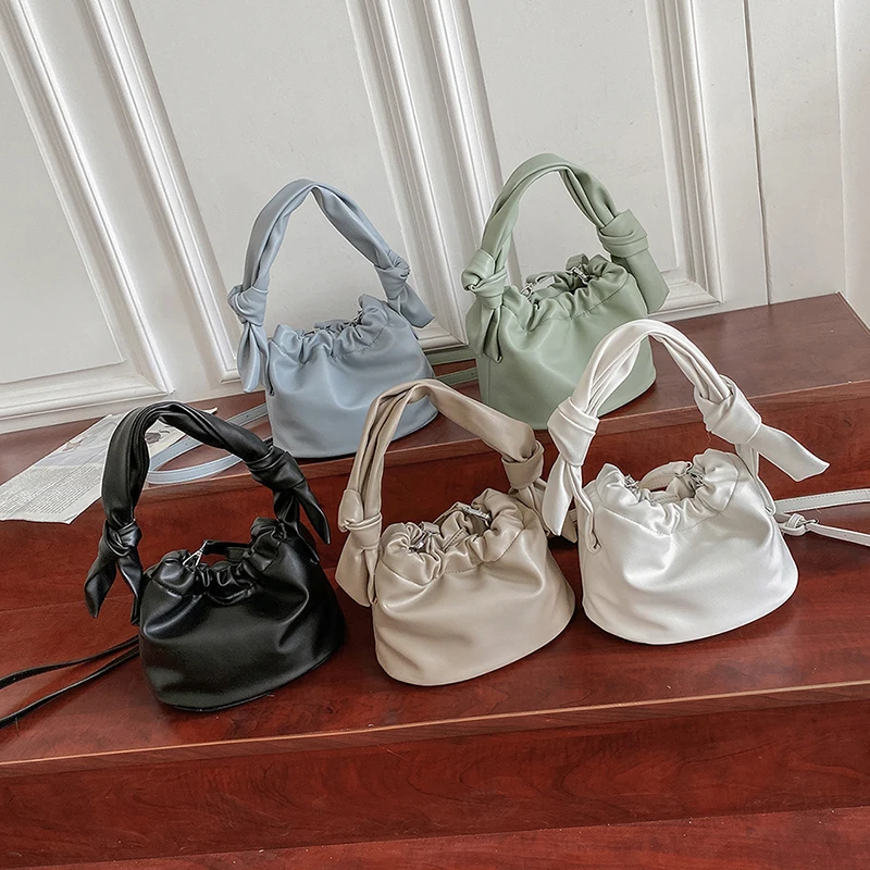 Solid Colour Mini Sweet PU Leather Bucket Crossbody Bags for Women 2021 Summer Luxury Trend Shoulder Handbags and Purses
Solid Colour Mini Sweet PU Leather Bucket Crossbody Bags for Women 2021 Summer Luxury Trend Shoulder Handbags and Purses
