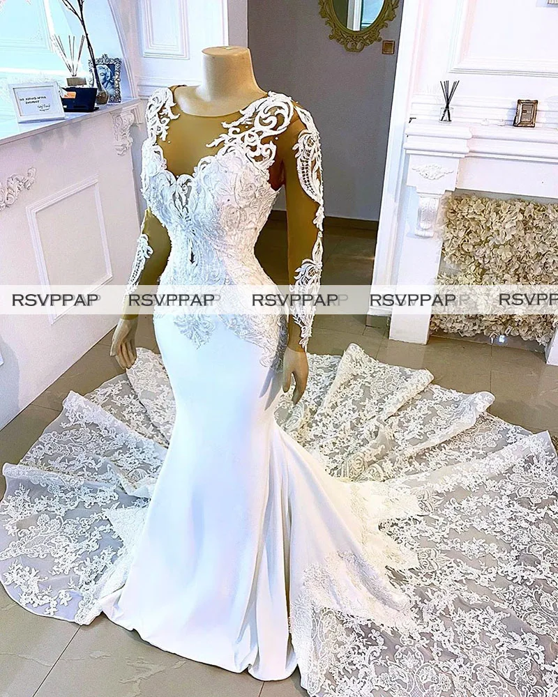 Luxury Lace Beach Wedding Dresses 2021 Beaded Sheer Top Long Sleeve White Mermaid African Women Bridal Wedding Gowns
Luxury Lace Beach Wedding Dresses 2021 Beaded Sheer Top Long Sleeve White Mermaid African Women Bridal Wedding Gowns