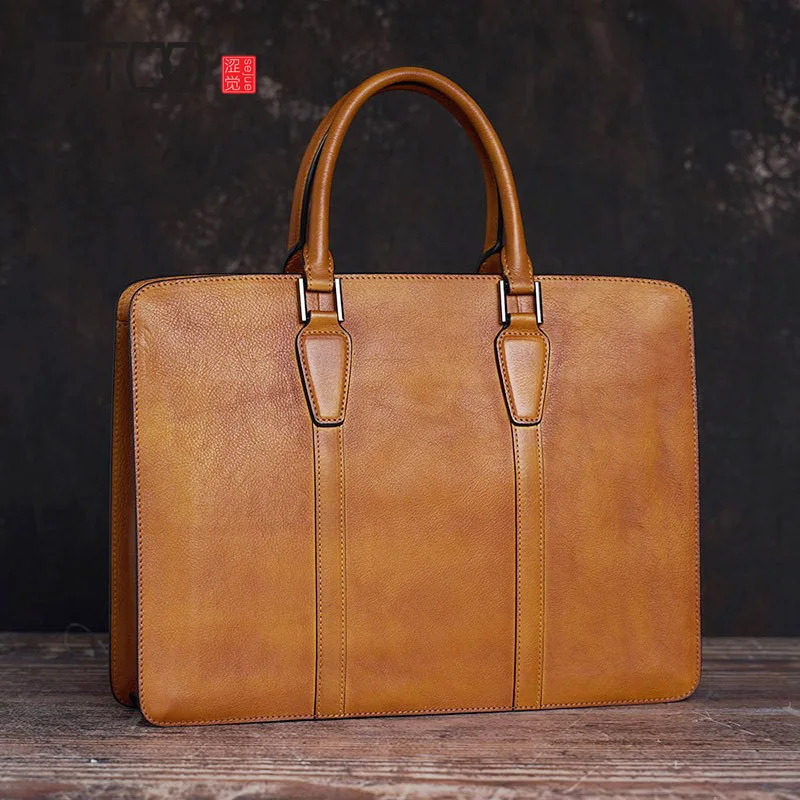 AETOO First layer cowhide handbag, literary simple men's bag, fashionable computer bag
AETOO First layer cowhide handbag, literary simple men's bag, fashionable computer bag