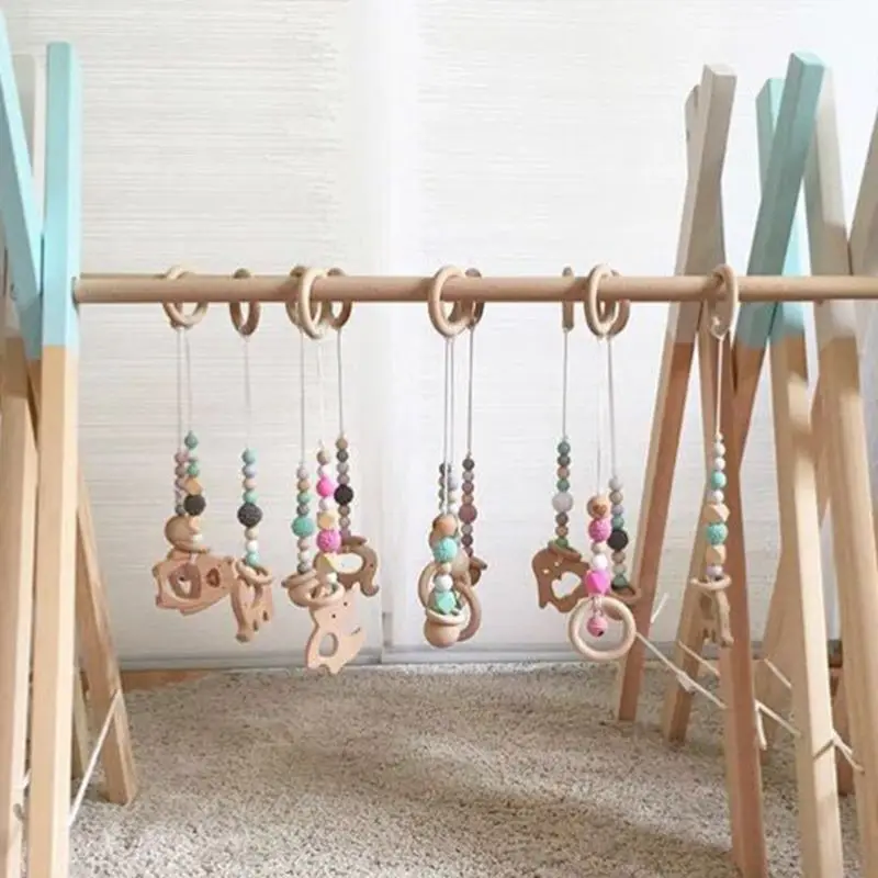 3 Pcs/set Nordic Baby Gym Frame Game Pendants Sensory Nursery Ring-pull Toy Wooden Clothes Rack Kids Room Decoration Gifts
3 Pcs/set Nordic Baby Gym Frame Game Pendants Sensory Nursery Ring-pull Toy Wooden Clothes Rack Kids Room Decoration Gifts