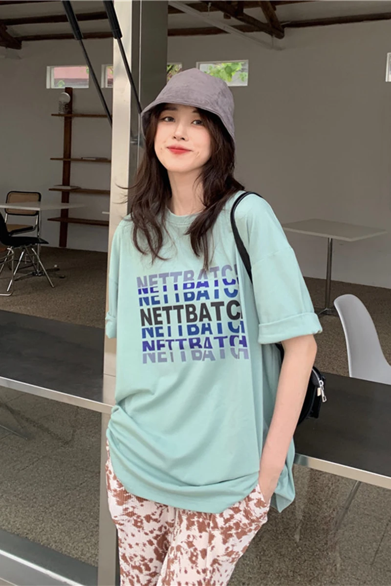 2021 summer new versatile short sleeve medium length T-shirt women's loose print round neck
2021 summer new versatile short sleeve medium length T-shirt women's loose print round neck