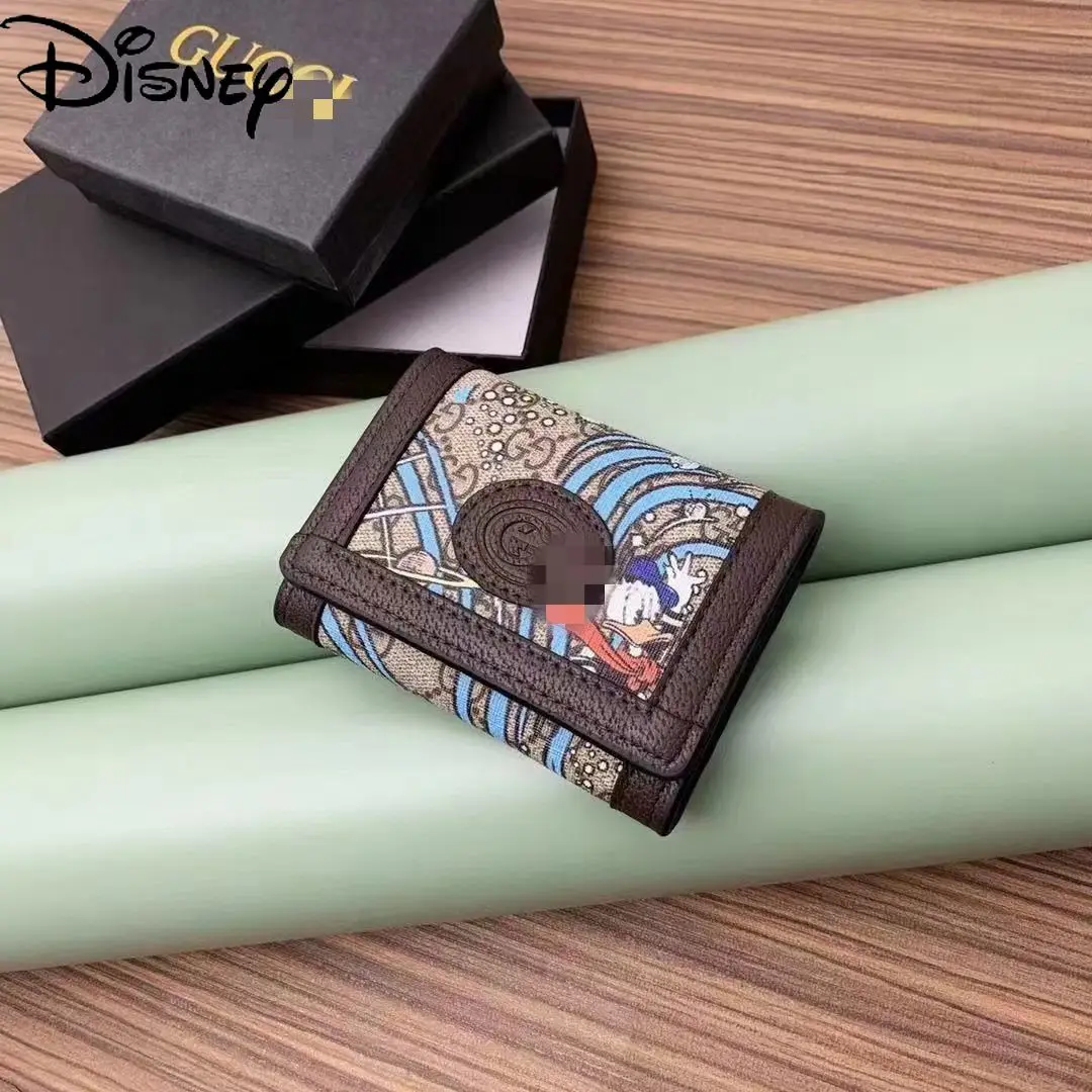 Disney Fashion Men's New 2021 Cute Cartoon Donald Duck Card Case Simple Portable Casual Short Small Wallet
Disney Fashion Men's New 2021 Cute Cartoon Donald Duck Card Case Simple Portable Casual Short Small Wallet