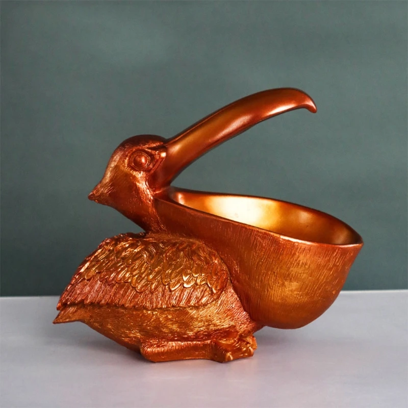 Creative Resin Pelican Statue Key Candy Container Cell Phone Holder Bird Figurines Table Desk Home Decoration 
Creative Resin Pelican Statue Key Candy Container Cell Phone Holder Bird Figurines Table Desk Home Decoration