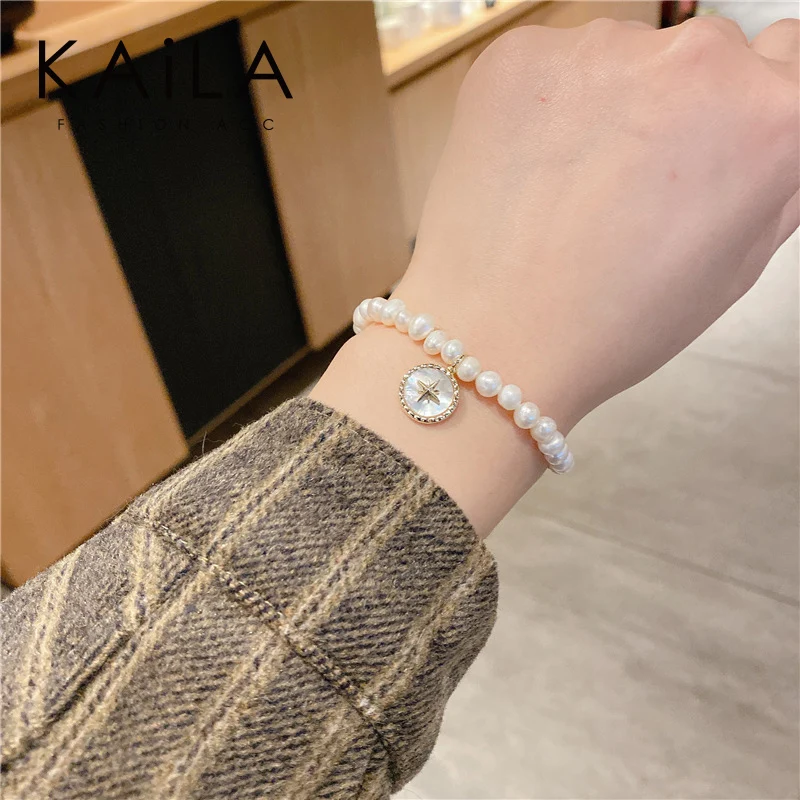

Eight mans star pearl bracelet ins niche design girls girlfriends cold wind students simple high-level feeling beaded tide