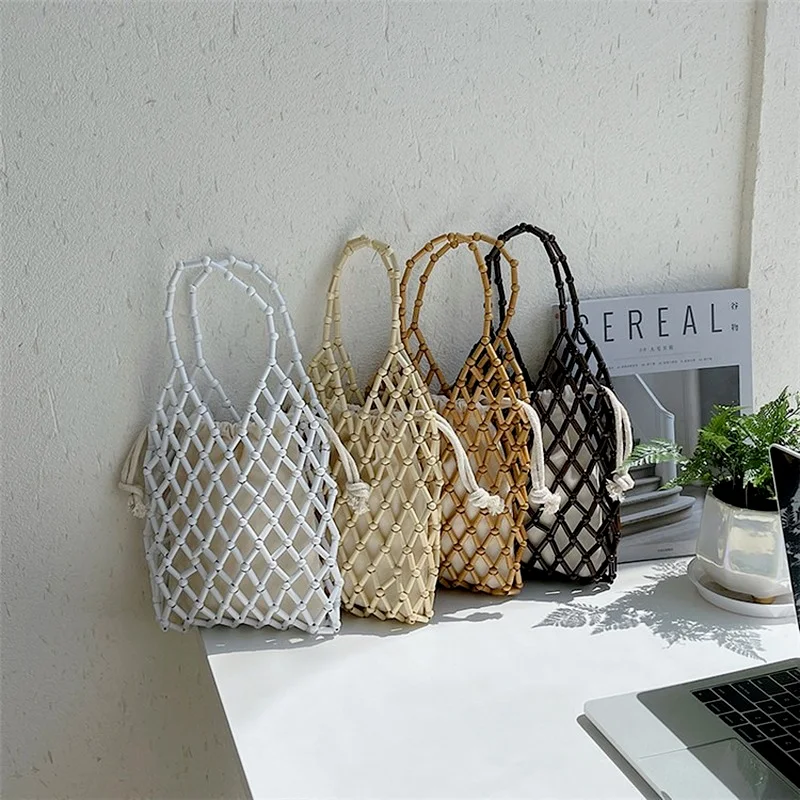 Summer New Bags Hand-beaded Handbags Niche Fashion Beads Bags and Hand-held Hollow Woven Tote Bags for Women Designer Bags
Summer New Bags Hand-beaded Handbags Niche Fashion Beads Bags and Hand-held Hollow Woven Tote Bags for Women Designer Bags