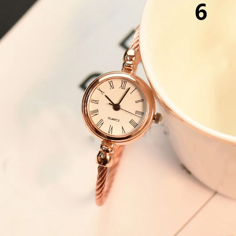 1 Pcs Women Lady Girl Student Wrist Quartz Watch Mini Round Alloy Vintage Gift FS99 
1 Pcs Women Lady Girl Student Wrist Quartz Watch Mini Round Alloy Vintage Gift FS99