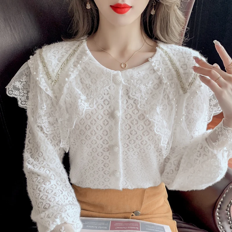 Stitching Embroidered Lace Women shirt beading Spring 2021 New female Ruffle Collar Hollow Lace Long-Sleeved Blouse Shirt 951E
Stitching Embroidered Lace Women shirt beading Spring 2021 New female Ruffle Collar Hollow Lace Long-Sleeved Blouse Shirt 951E